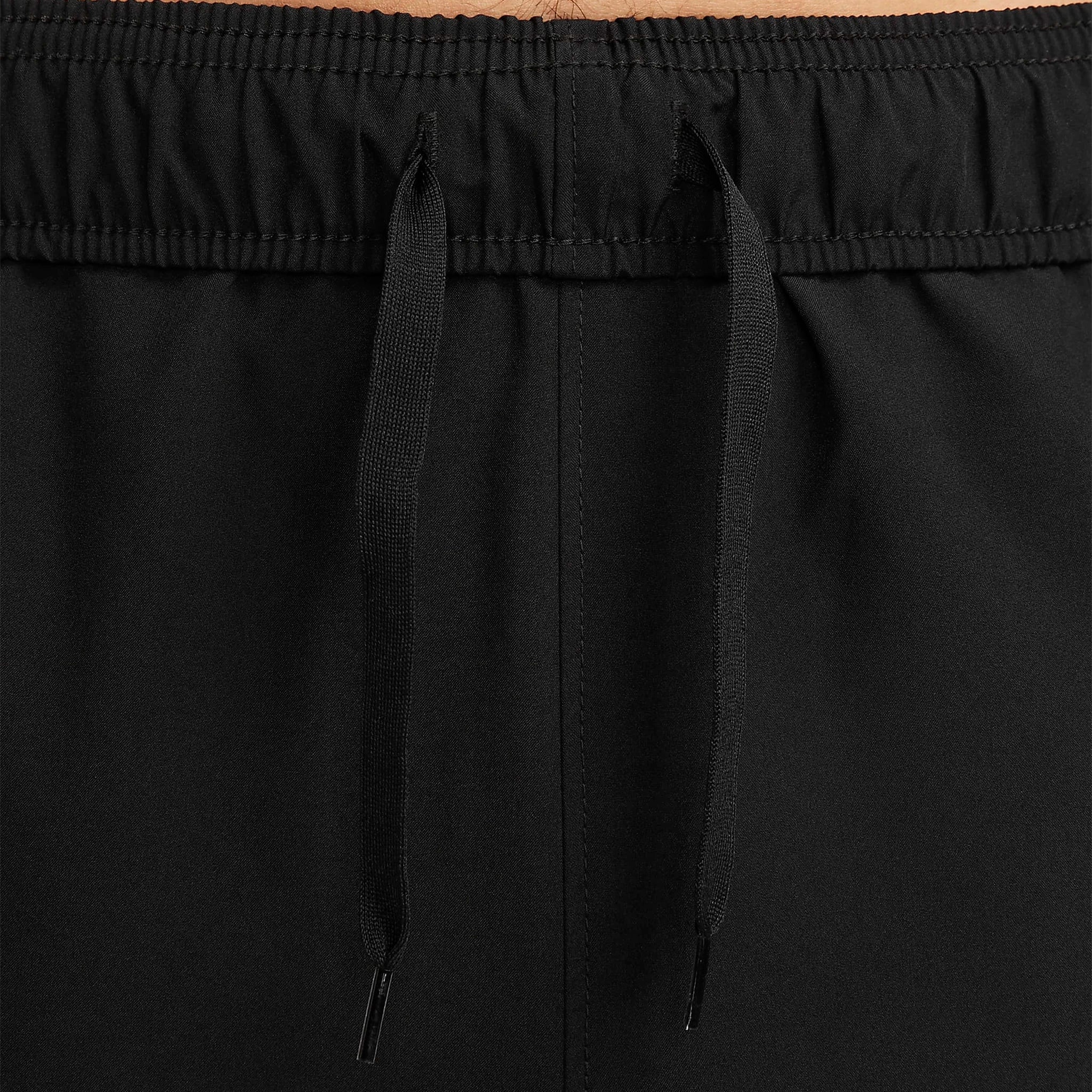 Model waist view of Nike Challenger Black Pants